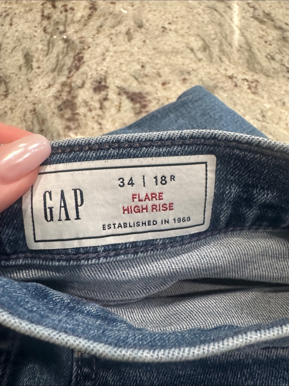 GAP women’s High-Rise Flare Jeans in Medium Blue Denim